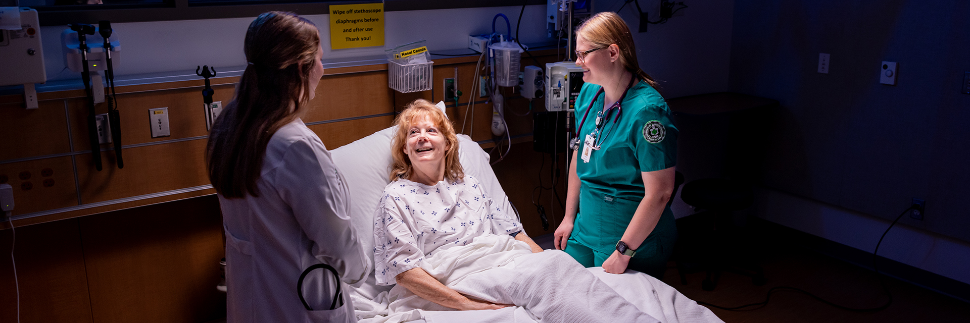 nurse and physician with hospital patient